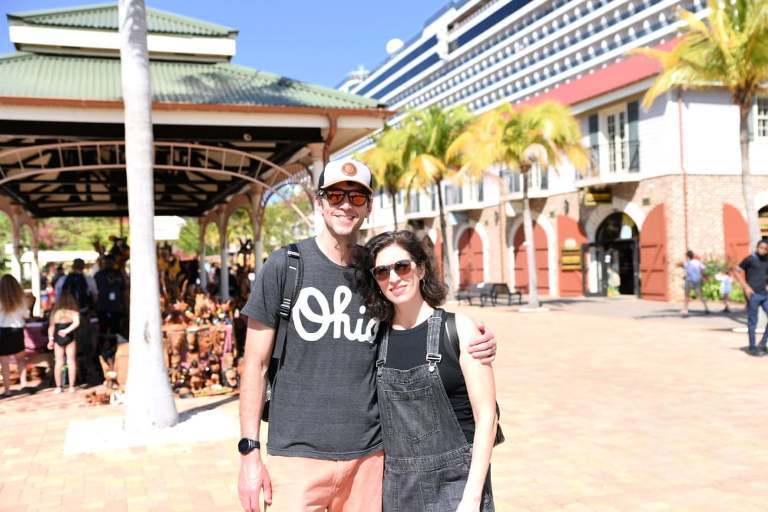 My husband and I--both white people with dark hair--standing together at the port in Falmouth Jamaica. 